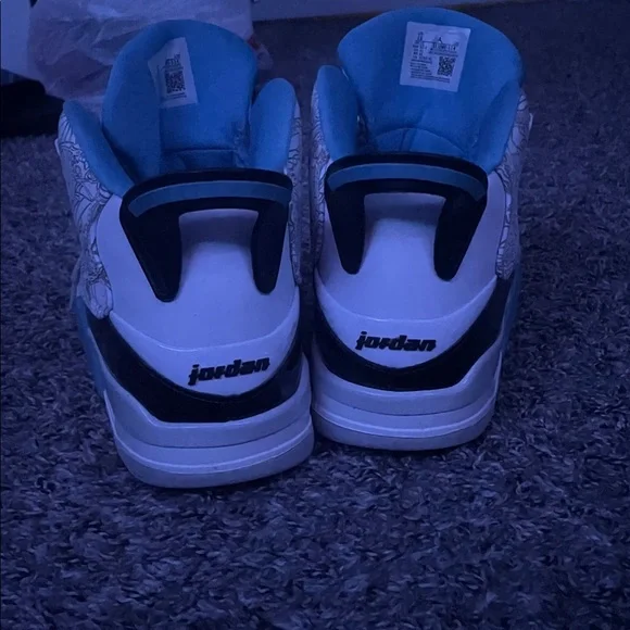 Jordan Sneakers with White, Black, and Blue Highlights